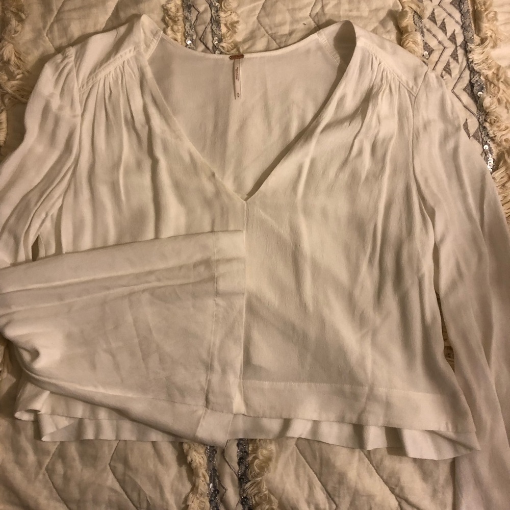 White bell sleeve crop top